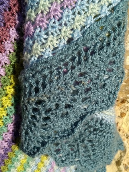 detail of lace edge of knitted shawl