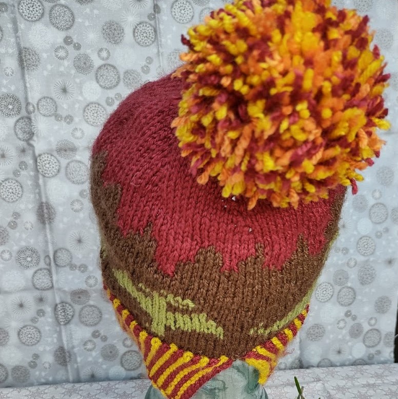 Back view of Dino Boom! bobble hat